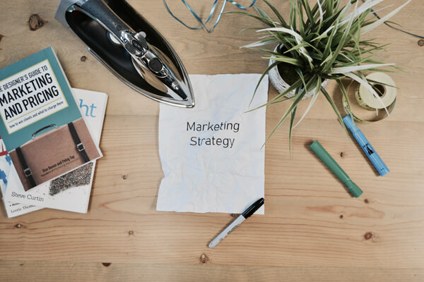 marketing strategy written on paper